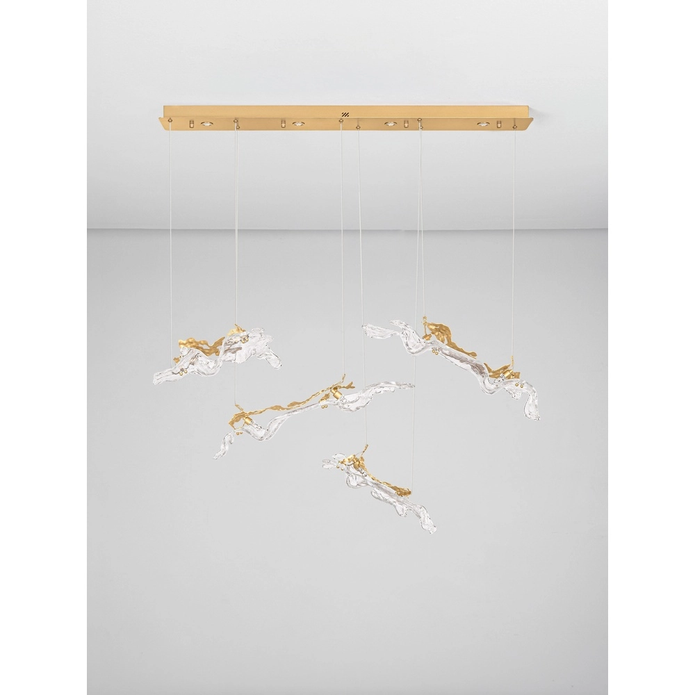 Lampe pendante dorée Avesa avec verre transparent 128 cm Lyora 5212063500426